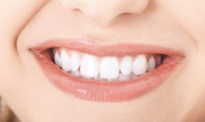 up close image of woman's beautiful smile