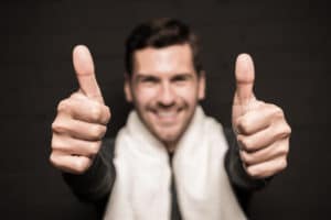 man with thumbs up