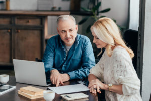 couple looking at laptop