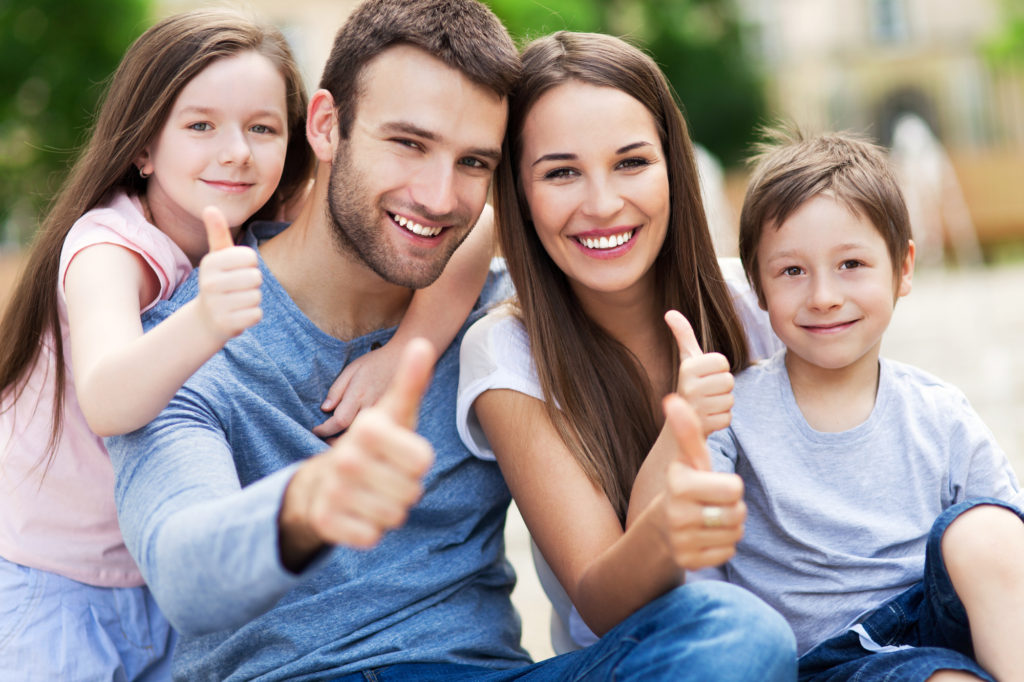 happy family with thumbs up