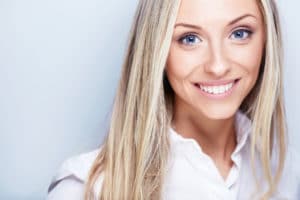 close up of woman smiling at camera