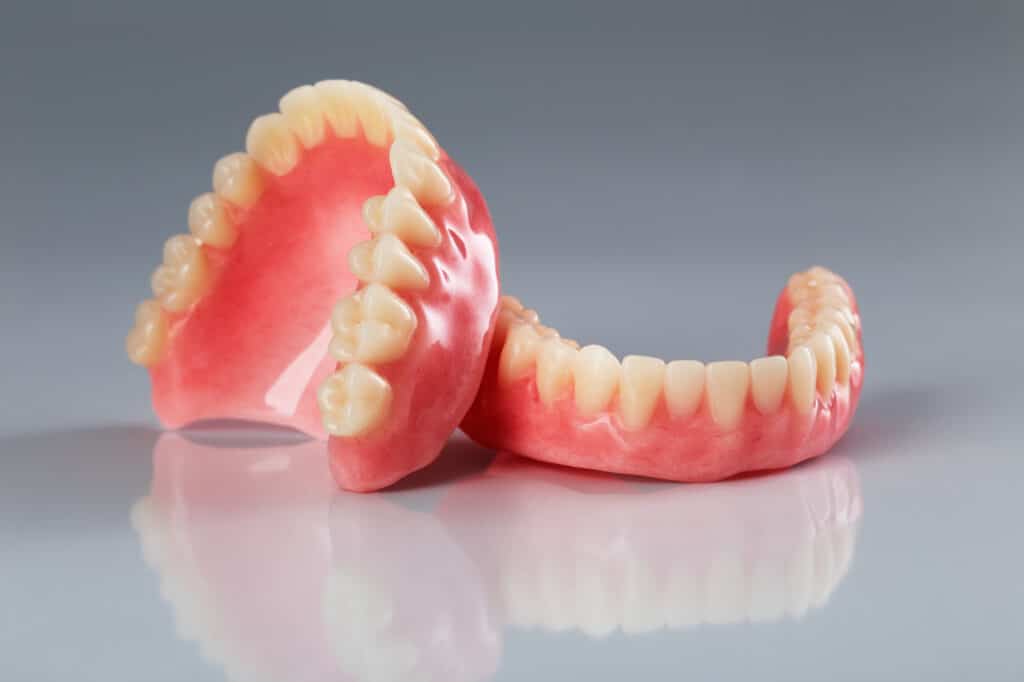 A picture of dentures laying on a table